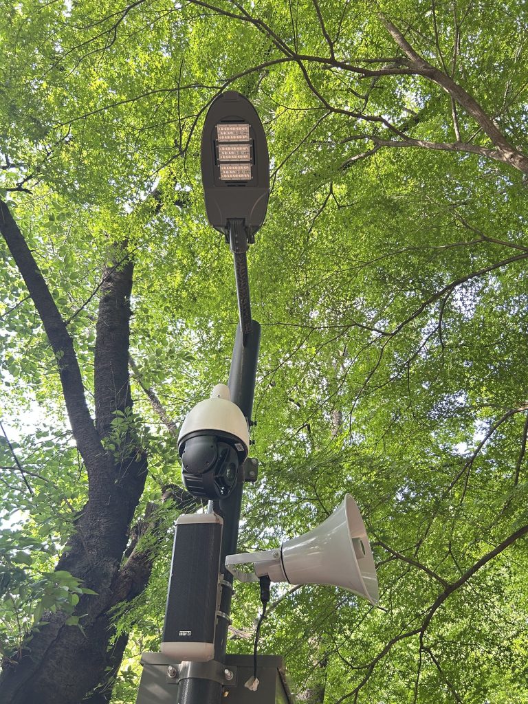 Home security camera on a wall